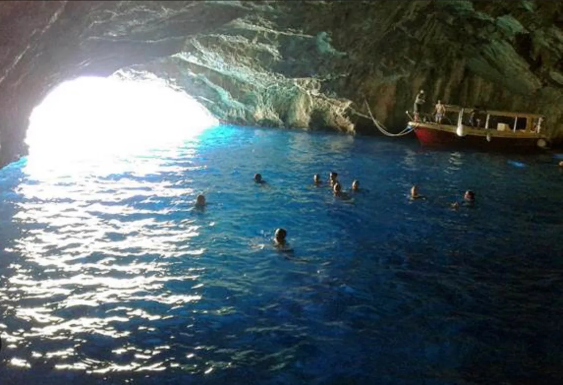 Blue Cave Montenegro with glowing blue water inside the sea cave