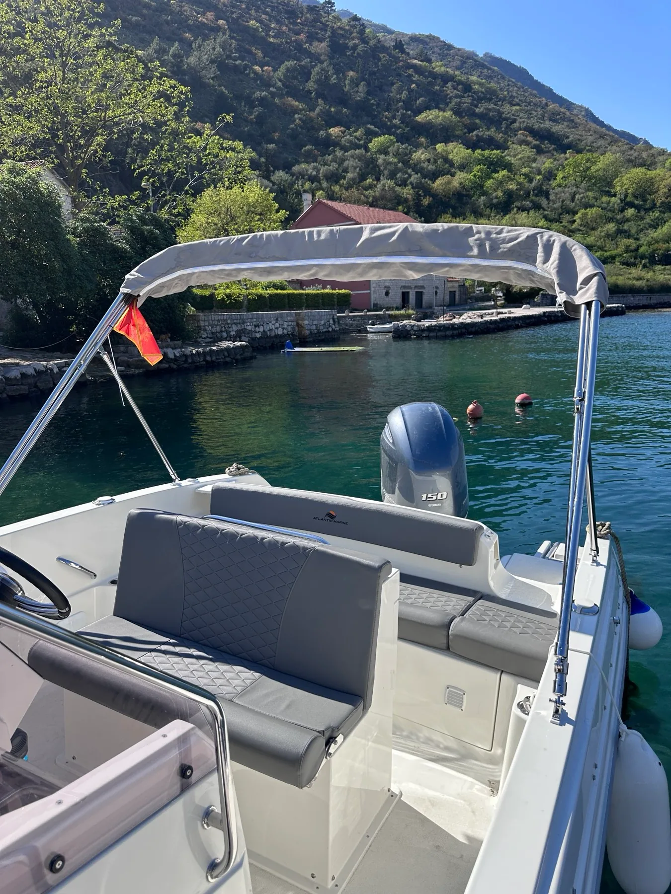 Yamaha 150 HP outboard engine and bimini sun cover