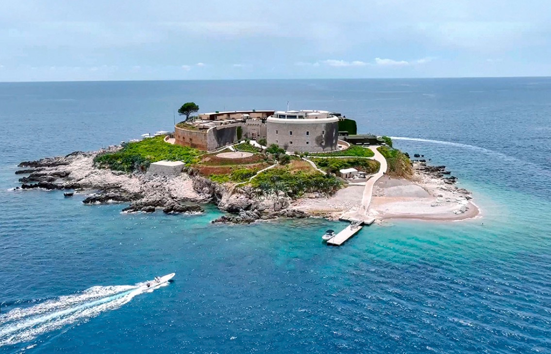 Mamula Island fortress at the entrance to Bay of Kotor surrounded by clear water