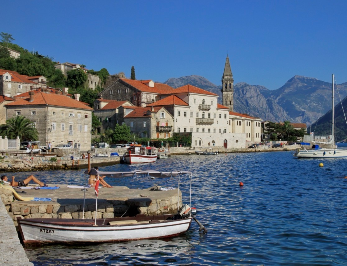 Perast baroque old town waterfront viewed from boat in Bay of Kotor Montenegro